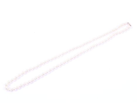 A vintage cultured-pearl single row necklace. The 74 round light-cream 'rose' (green-ish) beads, approx. 7.0-7.5mm diameter, 