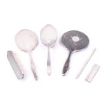 A silver mounted composite six piece dressing table set.