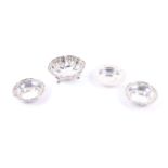 Two silver dishes and two others.
