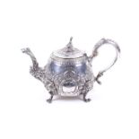 A late George III silver teapot.
