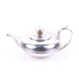 A George IV silver compressed round tea pot.