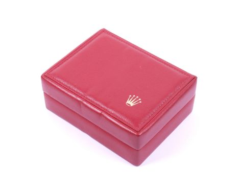 Rolex, a vintage red leather watch box, circa 1998. Enclosing a red velvet cushion, a card and paperwork wallet, the box  5.5
