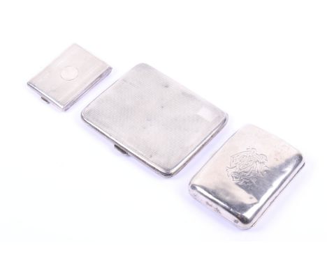 Two silver cigarette cases and a silver match book cover. One cigarette case marked William M Hayes, Birmingham 1897, having 