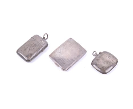 Two Victorian and later silver vesta/match cases and a match book cover. Comprising; an engine turned vesta case with an embo
