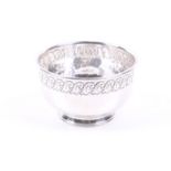 Liberty & Co Ltd, a planished-silver round bowl on foot.