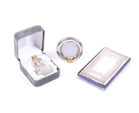 A small collection of silver including a modern silver 'tooth fairy' thimble shaped box. This with a gilt fairy finial on the