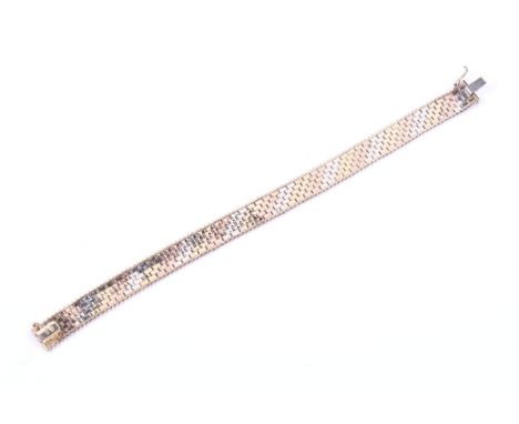A vintage Italian 9ct tri-colour gold block bracelet. In the from of satinised blocks between beaded borders on a push snap, 