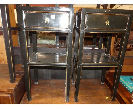 A pair of contemporary Oriental black painted two-tier lamp tables, each having single frieze drawer, w.39.5cm