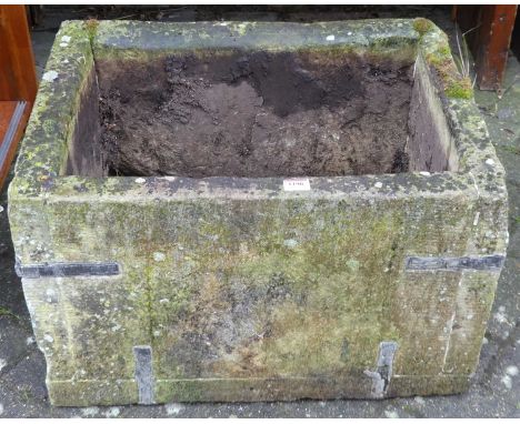 A 19th century stone and lead bound garden water basin, of plain rectangular form, 60 x 45.5cmpotential manmade hole present.