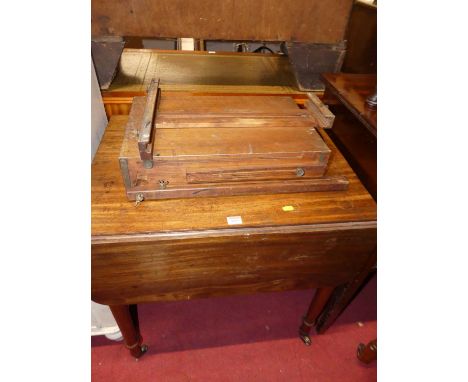 A Victorian mahogany round cornered Pembroke table, with single end drawer, together with a travelling artist's easel (2)