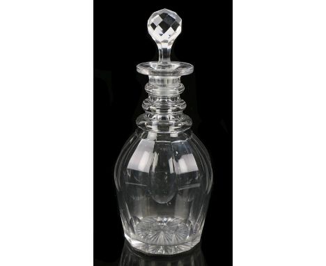 George III decanter, the three ring neck above a sliced cut bulbous body, together with a diamond cut stopper, 27cm high 