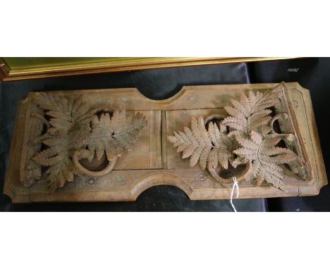 Black forest style ajustable book trough, with fern leaf carved folding ends, 43cm wide