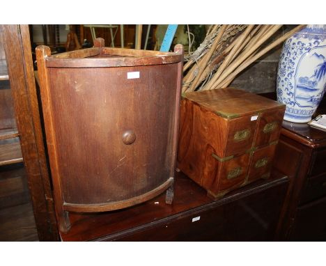 Campaign style chest of four drawers with recessed brass handles, corner stick stand with drip tray (2