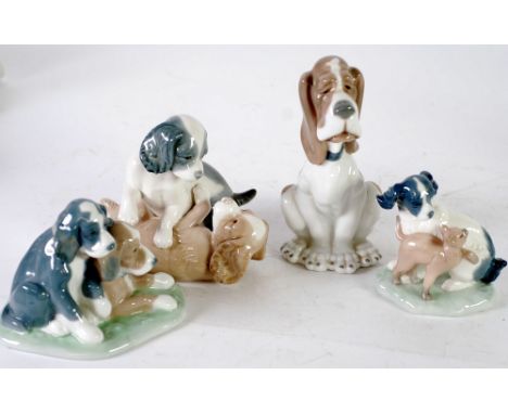 FOUR NAO PORCELAIN MODELS OF DOGS, 8" (20.3cm) high and smaller (4)