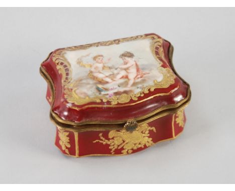 GERMAN ANTIQUE PORCELAIN CARTOUCHE SHAPED BOX WITH GILT METAL BORDER MOUNTS AND HINGE, the lid painted in large reserve with 