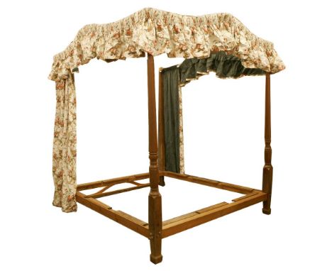 A George III and later mahogany four-poster bed, the hanging canopy on ring turned posts,205cm wide214cm deep242cm highProven