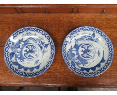 PAIR OF CHINESE BLUE AND WHITE GLAZED CERAMIC WAVE EDGED PLATES 