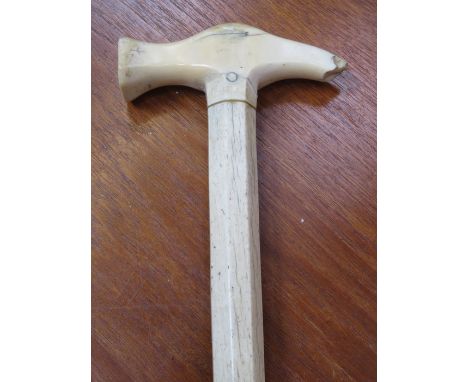 ANTIQUE WALRUS AND WHALE BONE OCTAGONAL SHAFTED WALKING STICK (AT FAULT)
