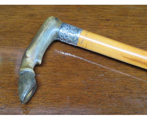 DECORATIVE SILVER MOUNTED WALKING STICK WITH HORN HANDLE IN THE FORM OF A HOOF 