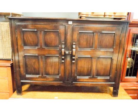 An Ercol oak  two door sideboard 4' wide 