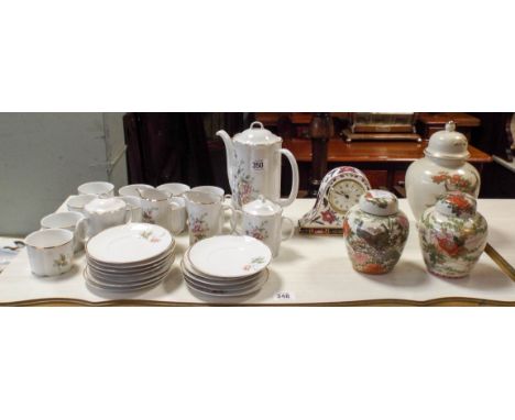 Floral decorated china coffee set, three ginger jars and a Royal Worcester mantle clock 
