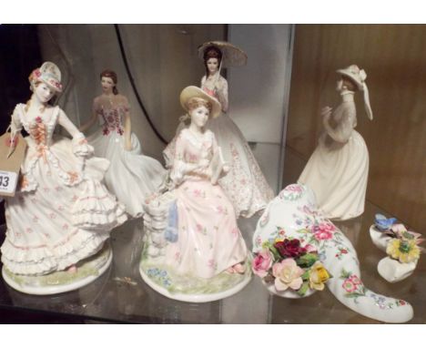 Four Royal Worcester lady figure ornaments, one other, a Worcester Cornucopia vase and two flower clusters  