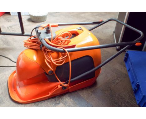 A Flymo electric hopper lawn mower