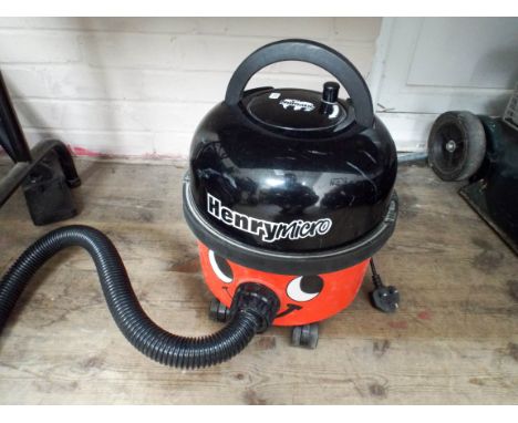 A Henry Hoover with tools