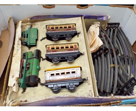An old Hornby train set, one damaged front wheel to engine  