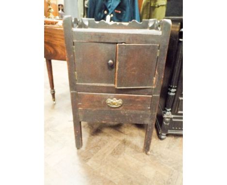 A Georgian mahogany tray topped commode fitted drawer and cupboard  
