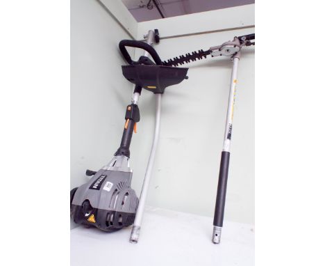 A Titan petrol engine strimmer with telescopic edge trimmer attachment 