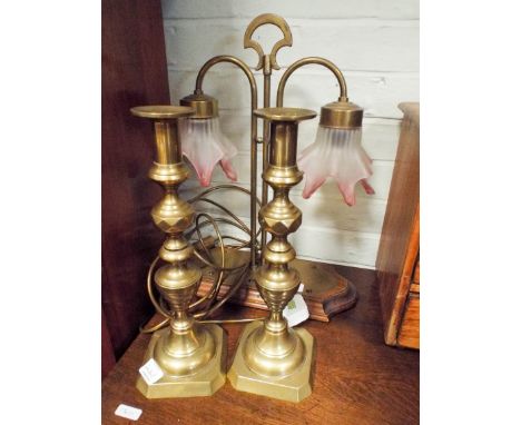 A two branch brass electric table lamp and a pair of 15" brass candlesticks 