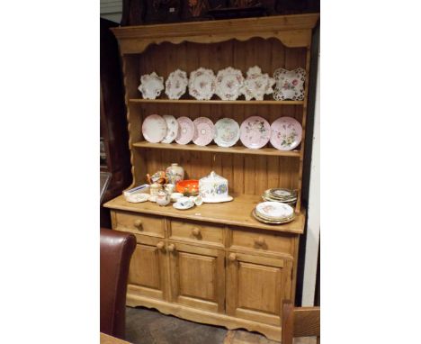 A Victorian style stripped and waxed pine Welsh style dresser with shelf back three drawers and cupboards under 53" wide  