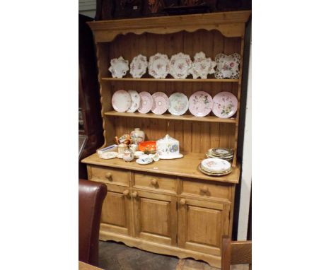 A Victorian style stripped and waxed pine Welsh style dresser with shelf back three drawers and cupboards under 53" wide  