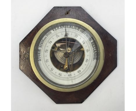 A WW1 era German bulkhead ships barometer, by repute taken from RMS Berengaria, formally known as SS Imperator. Brass body wi