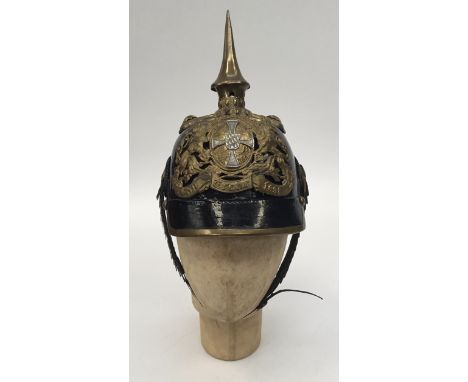 A M1871 Pattern Imperial Bavarian Reserve Officers Pickelhaube. Patent leather skull with cruciform mount to the crown, each 