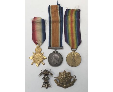 A WW1 1914 star trio, plus cap badges, awarded to 5589 A/Cpl Frederick Henry Sharp of the 12th Lancers, later Army Veterinary