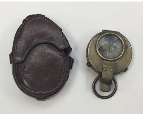 A WW1 Verniers style Compass in brass, with original leather case. In need of some restoration. Brass body with viewing windo