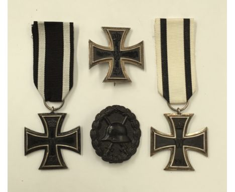 A selection of WW1 German medals / decorations. To include: an Iron Cross 1st class, with painted iron cross, silvered framed
