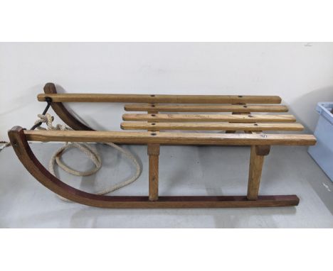 A vintage bentwood Scandinavian sledge with rope Location:A2F 