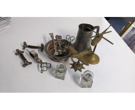 A mixed lot to include candlesnuffer, wine coaster, brass model of a Spitfire, cutlery rests, pair of ceiling lights, and oth
