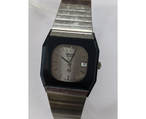 A Rado quartz, stainless steel cased wristwatch, having a silvered dial signed Rado, with centre seconds and baton hour marke