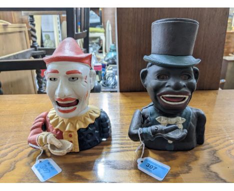 Two painted reproduction cast iron money boxes to include one depicting a clown Location:These items are listed on the basis 