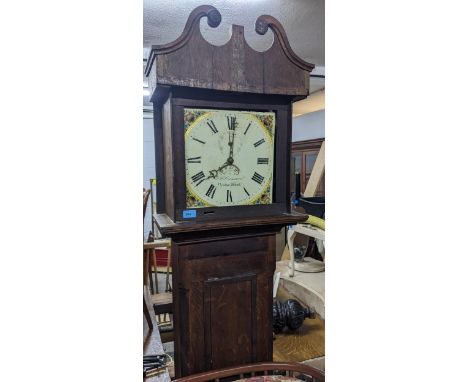A F.H Crossman Newton Abbot, an oak cased longcase clock off white painted face with roman numerals with one weightLocation: 