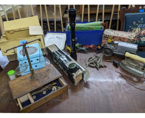 A group of toys, and other items to include a vintage Escalado games, a Louis Marx Corp. tin plate clockwork model of a tract