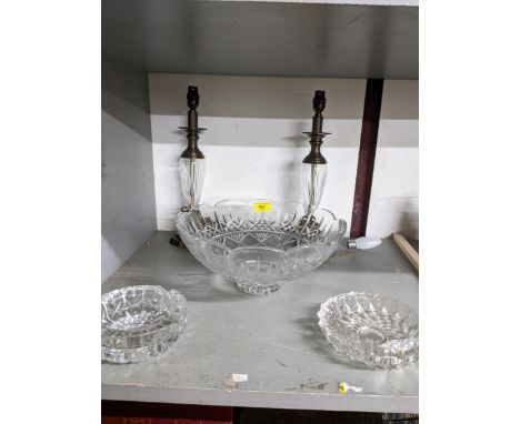 A large Waterford cut glass fruit bowl with scalloped rim edge, two cut and metal mounted contemporary table lamps, and two g