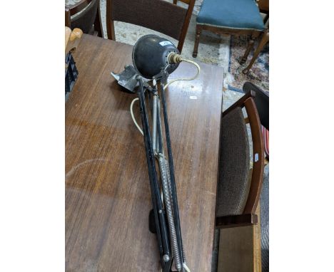 The Anglepoise, A Herbert Terry adjustable lamp, fitting for mounting on a work bench or wall, block finished with shadeLocat