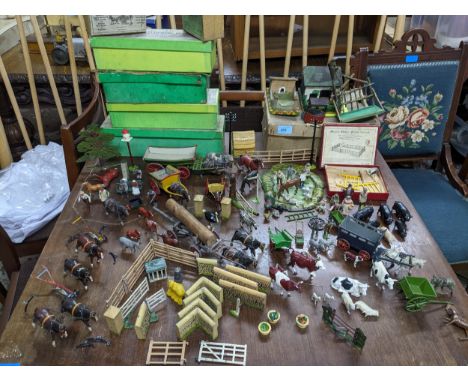 A collection of Britain's hollow lead cast farm sets to include a model home farm series including farm animals, ploughs, fig