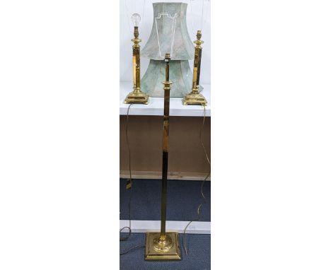 A vintage brass standard lamp together with a pair of table lampsLocation: 