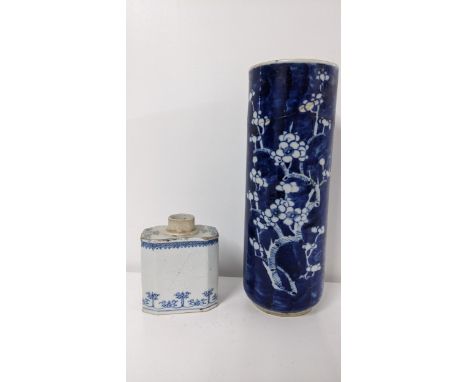 An 18th century Chinese blue and white octagonal shaped tea caddy incised with floral decoration, 10.5cm h with a Prunus patt